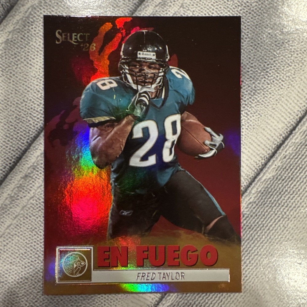 Panini 2026 Decades: 90s Pop Culture - Fred Taylor En Fuego Holo Foil Jaguars